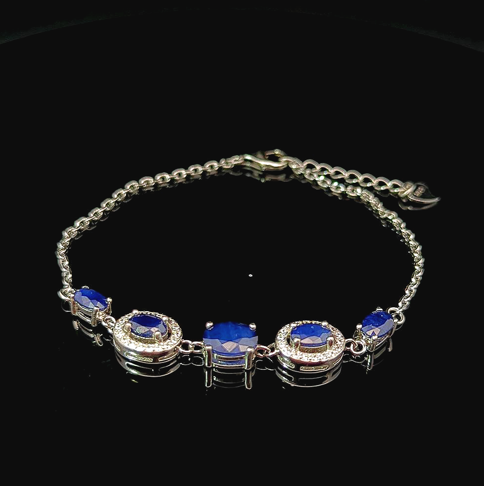 Clarabelle – Blue Sapphires and White Topaz