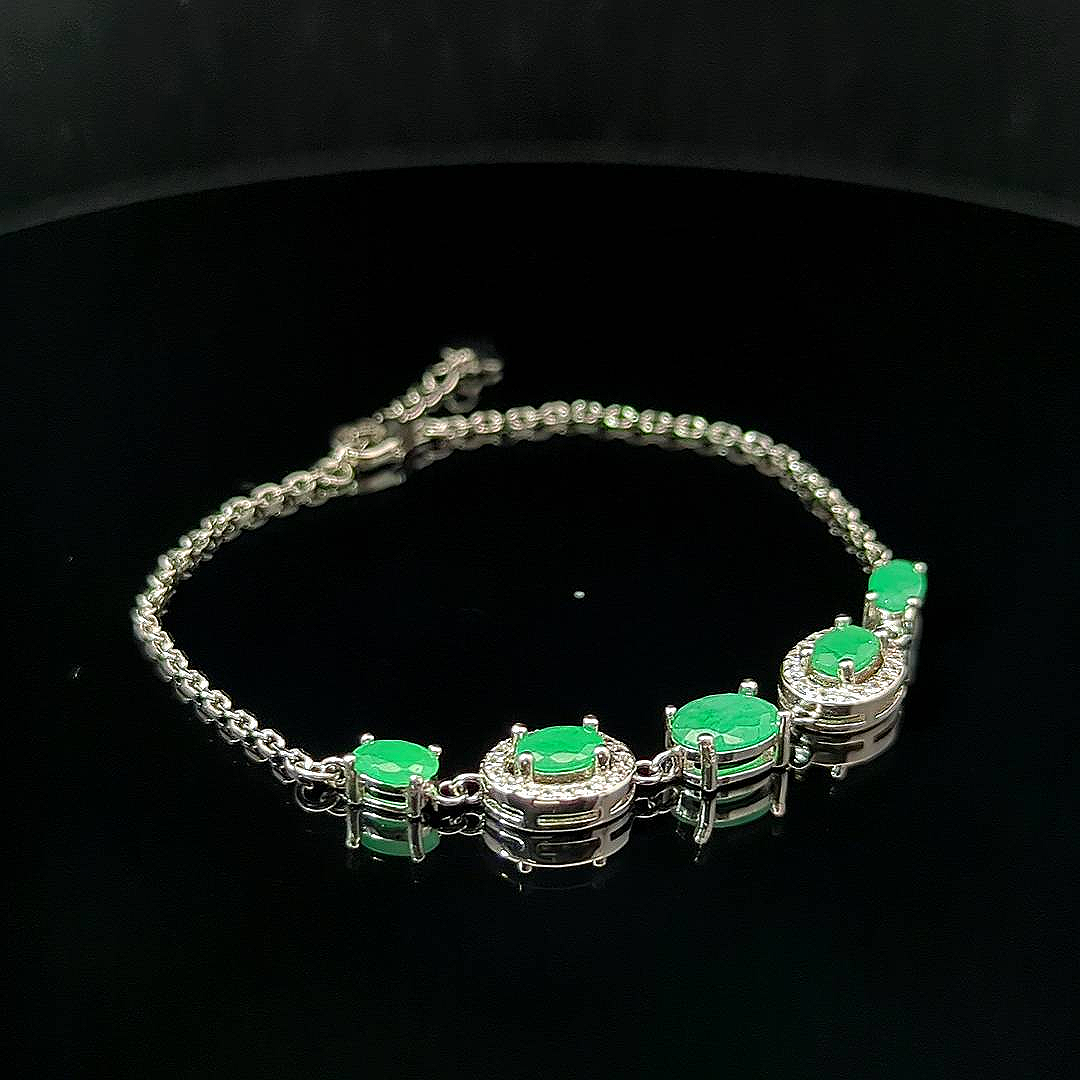 Clarabelle – Emerald and White Topaz