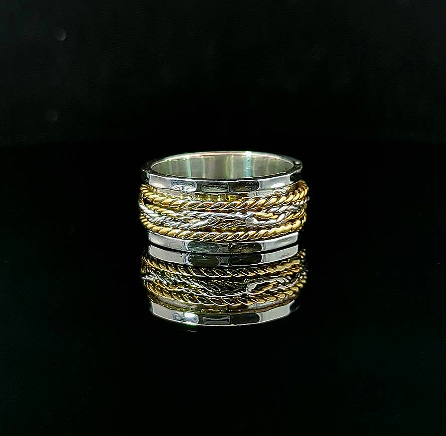 Decha – Sterling Silver and Brass