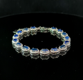 Oval Tennis Bracelet – Blue Sapphire and White Topaz