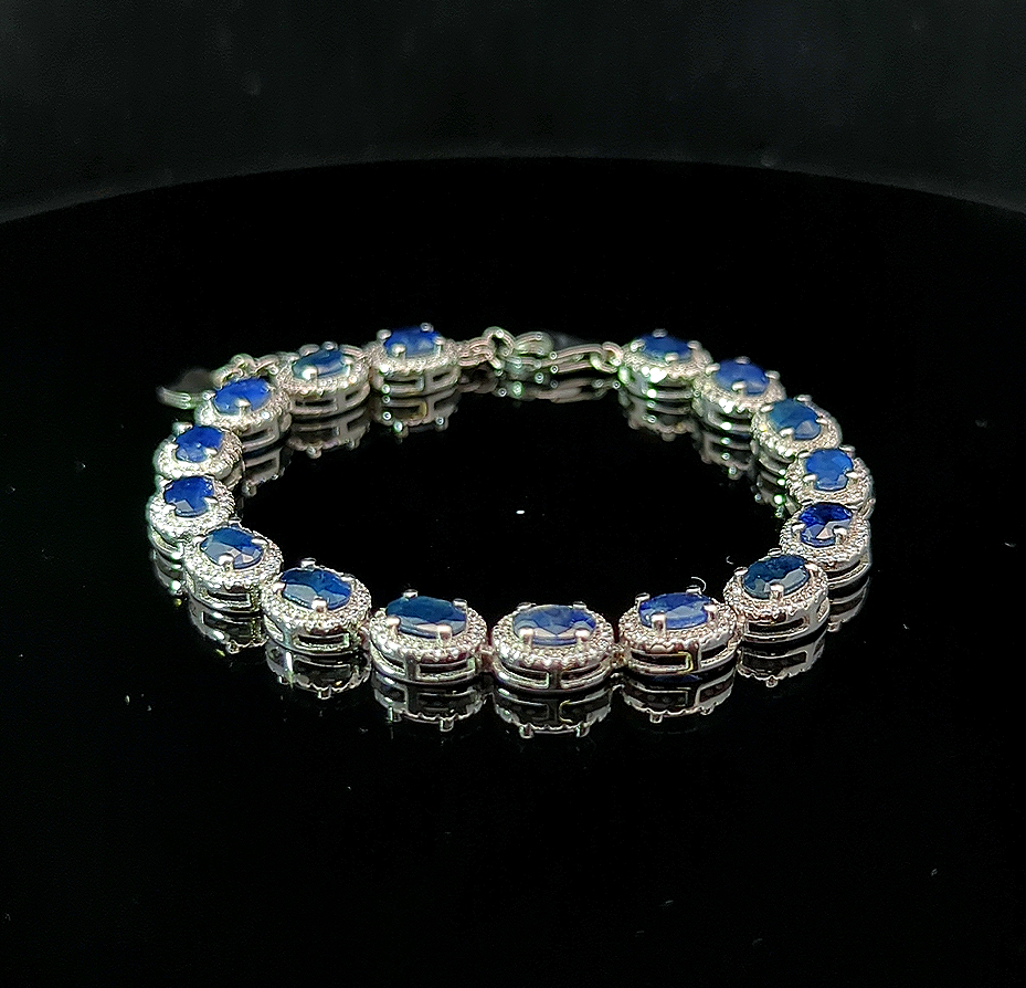 Oval Tennis Bracelet – Blue Sapphire and White Topaz