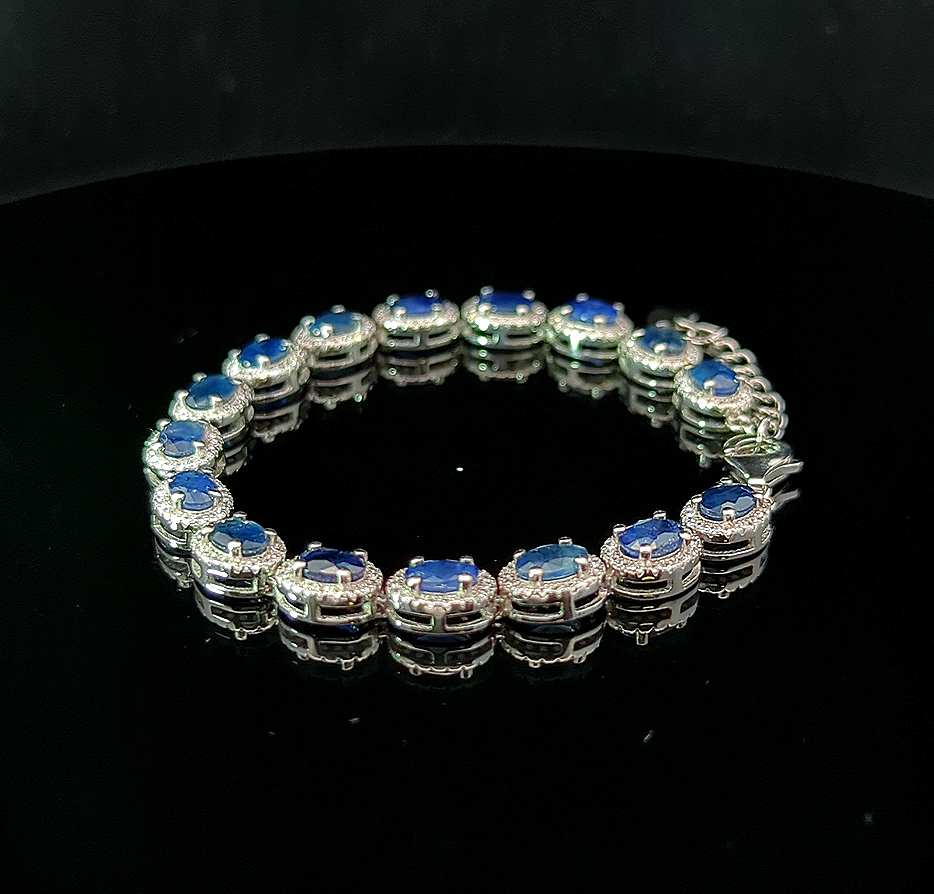 Oval Tennis Bracelet – Blue Sapphire and White Topaz