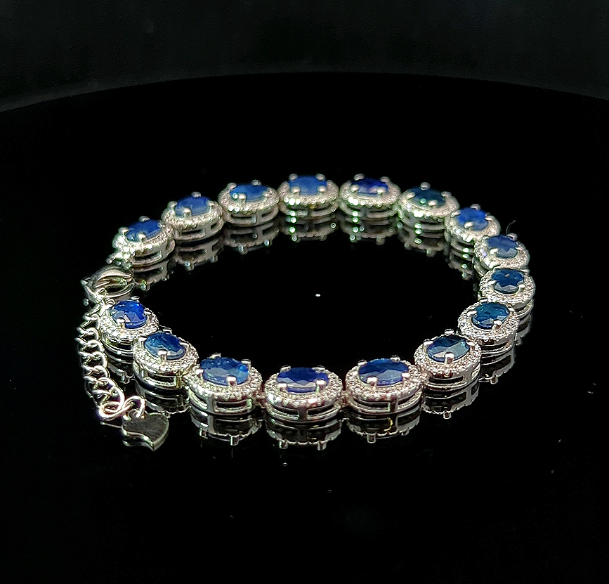 Oval Tennis Bracelet – Blue Sapphire and White Topaz