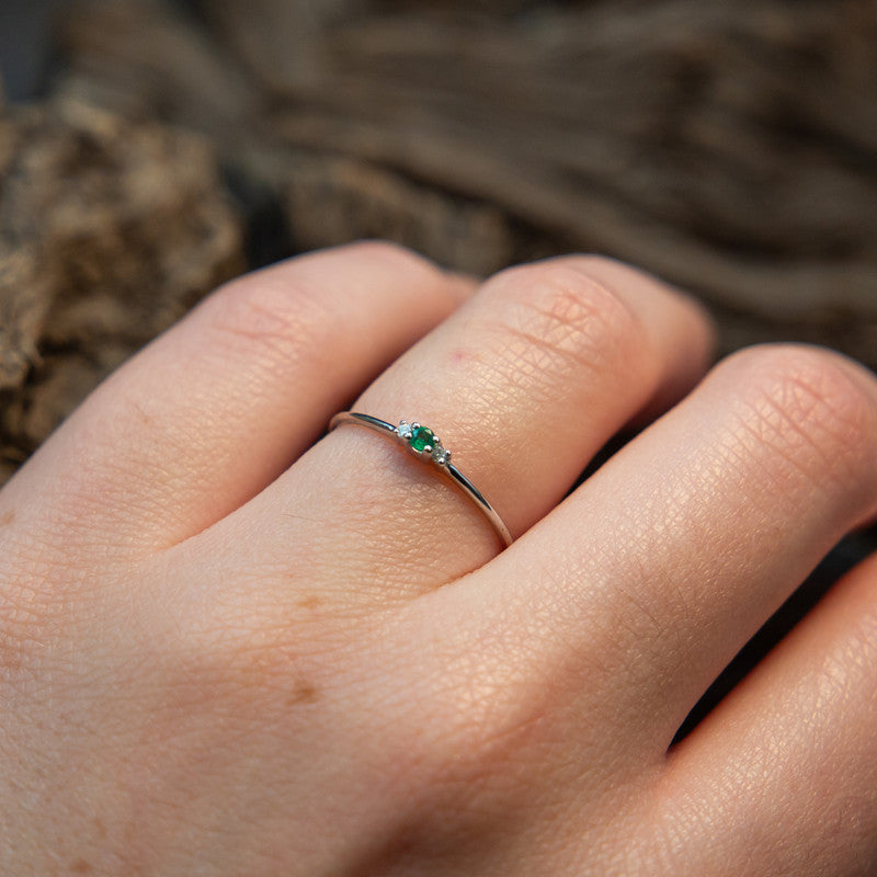 Katharine White – 18ct White Gold with 0.04ct Natural Diamonds and 0.04ct Emerald